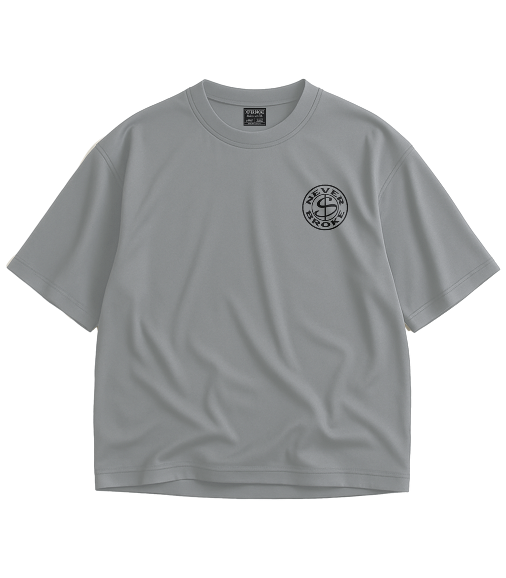 NEVER BROKE Premium Oversized Essential T-Shirt